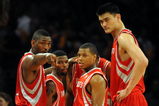 LOS ANGELES, CA - MAY 06:  (L-R) Ron Artest #96, Aaron Brooks #0, Kyle Lowry #7 and Yao Ming #11 of the Houston Rockets huddle against the Los Angeles Lakers in Game Two of the Western Conference Semifinals during the 2009 NBA Playoffs at Staples Center on May 6, 2009 in Los Angeles, California. NOTE TO USER: User expressly acknowledges and agrees that, by downloading and or using this photograph, User is consenting to the terms and conditions of the Getty Images License Agreement.  (Photo by Harry How/Getty Images)