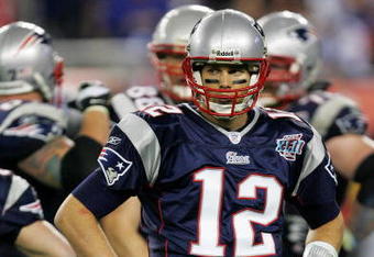 GLENDALE, AZ - FEBRUARY 03:  Tom Brady #12 of the New England Patriots waits for a play in the fourth quarter of Super Bowl XLII against the New York Giants on February 3, 2008 at the University of Phoenix Stadium in Glendale, Arizona.  (Photo by Streeter Lecka/Getty Images)