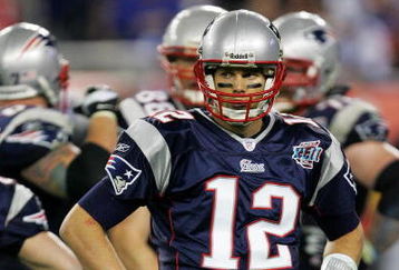 GLENDALE, AZ - FEBRUARY 03:  Tom Brady #12 of the New England Patriots waits for a play in the fourth quarter of Super Bowl XLII against the New York Giants on February 3, 2008 at the University of Phoenix Stadium in Glendale, Arizona.  (Photo by Streeter Lecka/Getty Images)