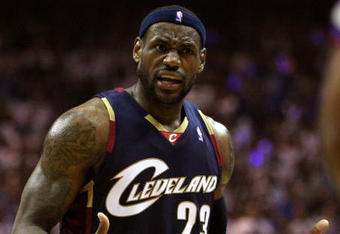 ORLANDO, FL - MAY 30:  LeBron James #23 of the Cleveland Cavaliers reacts after a play against the Orlando Magic in Game Six of the Eastern Conference Finals during the 2009 Playoffs at Amway Arena on May 30, 2009 in Orlando, Florida. NOTE TO USER: User expressly acknowledges and agrees that, by downloading and or using this photograph, User is consenting to the terms and conditions of the Getty Images License Agreement  (Photo by Elsa/Getty Images)