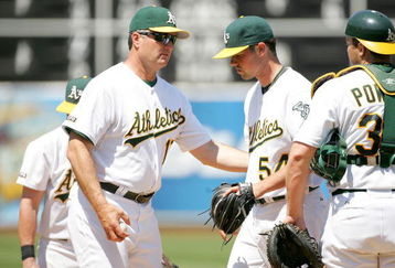 OAKLAND, CA - JUNE 28:  Manager Bob Geren takes out Vin Mazzaro #54 of the Oakland Athletics in the sixth inning of their game against the Colorado Rockies at the Oakland Coliseum on June 28, 2009 in Oakland, California.  (Photo by Ezra Shaw/Getty Images)