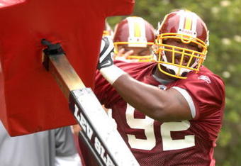ASHBURN, VA - MAY 1:  Albert Haynesworth #92 of the Washington Redskins runs through drills during minicamp on May 1, 2009 at Redskins Park in Ashurn, Virginia.   (Photo by Mitchell Layton/Getty Images)