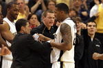 WINSTON-SALEM, NC - FEBRUARY 26:  Head coach Dino Gaudio celebrates with his player James Johnson #23 of the Wake Forest Demon Deacons during their 85-78 victory over the North Carolina State Wolfpack at Lawrence Joel Coliseum on February 26, 2009 in Winston-Salem, North Carolina.  (Photo by Streeter Lecka/Getty Images)
