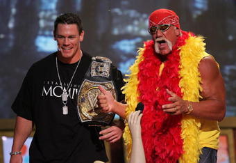 UNIVERSAL CITY, CA - AUGUST 14:  Wrestlers John Cena and Hulk Hogan present an award onstage at the 2005 Teen Choice Awards held at Gibson Amphitheatre at Universal CityWalk on August 14, 2005 in Universal City, California.  (Photo by Kevin Winter/Getty Images)