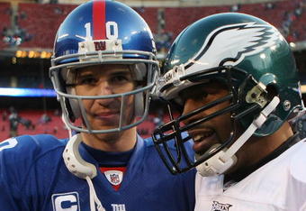 EAST RUTHERFORD, NJ - DECEMBER 07:  Eli Manning #10 of the New York Giants meets with Donovan McNabb #5 of the Philadelphia Eagles at the conclusion of their game at Giants Stadium on December 7, 2008 in East Rutherford, New Jersey.  (Photo by Nick Laham/Getty Images)