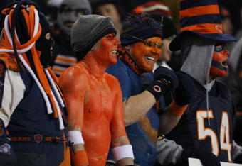 CHICAGO - DECEMBER 22:  Fans of the Chicago Bears cheer on their team during a game against the Green Bay Packers on December 22, 2008 at Soldier Field in Chicago, Illinois. (Photo by Jonathan Daniel/Getty Images)