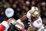 COLLEGE PARK, MD - NOVEMBER 22:  Chris Turner #10 of the Maryland Terrapins is sacked by Everette Brown #99 of the Florida State Seminoles on November 22, 2008 at Byrd Stadium in College Park, Maryland.  (Photo by Jim McIsaac/Getty Images)