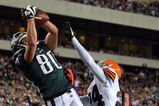 PHILADELPHIA - DECEMBER 15:  Kevin Curtis #80 of the Philadelphia Eagles catches a touchdown pass in the first quarter as Eric Wright #24 of the Cleveland Browns covers him on December 15, 2008 at Lincoln Financial Field in Philadelphia, Pennsylvania.  (Photo by Jim McIsaac/Getty Images)
