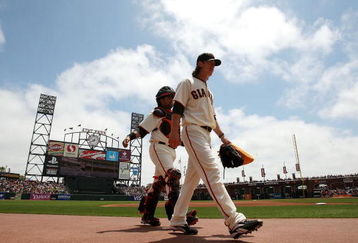 SAN FRANCISCO - JUNE 17:  Tim Lincecum #55 and Bengie Molina #1 of the San Francisco Giants walk in from the bullpen before the start of a game against the Los Angeles Angels of Anaheim at AT&T Park on June 17, 2009 in San Francisco, California.  (Photo by Ezra Shaw/Getty Images)