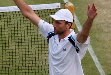 WIMBLEDON, ENGLAND - JUNE 29:  Ivo Karlovic of Croatia celebrates victory during the men's singles fourth round match against Fernando Verdasco of Spain on Day Seven of the Wimbledon Lawn Tennis Championships at the All England Lawn Tennis and Croquet Club on June 29, 2009 in London, England.  (Photo by Hamish Blair/Getty Images)