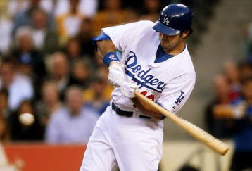 LOS ANGELES - JUNE 10:  Andre Ethier #16 of the Los Angeles Dodgers hits an RBI single in the first inning against the San Diego Padres on June 10, 2009 at Dodger Stadium in Los Angeles, California.  (Photo by Stephen Dunn/Getty Images)