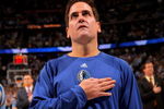 DENVER - MAY 05:  Mark Cuban, owner of the Dallas Mavericks observes the national anthem prior to facing the Denver Nuggets in Game Two of the Western Conference Semifinals during the 2009 NBA Playoffs at Pepsi Center on May 5, 2009 in Denver, Colorado. The Nuggets defeated the Mavericks 117-105. NOTE TO USER: User expressly acknowledges and agrees that, by downloading and or using this photograph, User is consenting to the terms and conditions of the Getty Images License Agreement.  (Photo by Doug Pensinger/Getty Images)