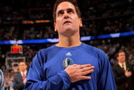 DENVER - MAY 05:  Mark Cuban, owner of the Dallas Mavericks observes the national anthem prior to facing the Denver Nuggets in Game Two of the Western Conference Semifinals during the 2009 NBA Playoffs at Pepsi Center on May 5, 2009 in Denver, Colorado. The Nuggets defeated the Mavericks 117-105. NOTE TO USER: User expressly acknowledges and agrees that, by downloading and or using this photograph, User is consenting to the terms and conditions of the Getty Images License Agreement.  (Photo by Doug Pensinger/Getty Images)