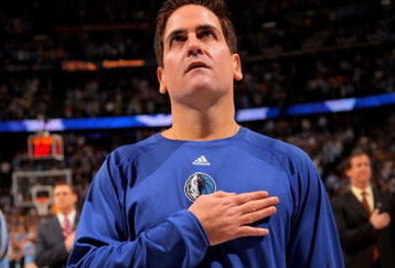 DENVER - MAY 05:  Mark Cuban, owner of the Dallas Mavericks observes the national anthem prior to facing the Denver Nuggets in Game Two of the Western Conference Semifinals during the 2009 NBA Playoffs at Pepsi Center on May 5, 2009 in Denver, Colorado. The Nuggets defeated the Mavericks 117-105. NOTE TO USER: User expressly acknowledges and agrees that, by downloading and or using this photograph, User is consenting to the terms and conditions of the Getty Images License Agreement.  (Photo by Doug Pensinger/Getty Images)