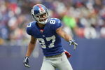EAST RUTHERFORD, NJ - DECEMBER 7:  Domenik Hixon #87 of the New York Giants points on the field against the Philadelphia Eagles at Giants Stadium on December 7, 2008 in East Rutherford, New Jersey. (Photo by Nick Laham/Getty Images)