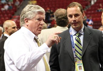 MONTREAL, QC - JUNE 26:  President & General Manager Brian Burke (L) of the Toronto Maple Leafs talks with Genral Manager Joe Nieuwendyk of the Dallas Stars prior to the first round of the 2009 NHL Entry Draft at the Bell Centre on June 26, 2009 in Montreal, Quebec, Canada.  (Photo by Bruce Bennett/Getty Images)