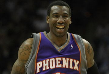SAN ANTONIO - APRIL 29:  Amare Stoudemire #1 of the Phoenix Suns reacts to no foul called after his layup against the San Antonio Spurs during the second quarter in Game Five of the Western Conference Quarterfinals during the 2008 NBA Playoffs at the AT&T Center on April 29, 2008 in San Antonio, Texas.  NOTE TO USER: User expressly acknowledges and agrees that, by downloading and or using this photograph, User is consenting to the terms and conditions of the Getty Images License Agreement.  (Photo by Harry How/Getty Images)  