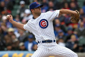 CHICAGO - APRIL 15: Starting pitcher Rich Harden #40 of the Chicago Cubs delivers the ball against the Colorado Rockies on April 15, 2009 at Wrigley Field in Chicago, Illinois. The Rockies defeated the Cubs 5-2. (Photo by Jonathan Daniel/Getty Images)
