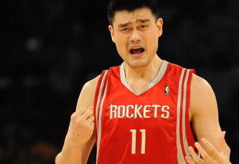 LOS ANGELES, CA - MAY 06:  Yao Ming #11 of the Houston Rockets reacts to a foul called on him in the second quarter against the Los Angeles Lakers in Game Two of the Western Conference Semifinals during the 2009 NBA Playoffs at Staples Center on May 6, 2009 in Los Angeles, California. NOTE TO USER: User expressly acknowledges and agrees that, by downloading and or using this photograph, User is consenting to the terms and conditions of the Getty Images License Agreement.  (Photo by Harry How/Getty Images)