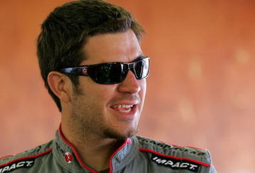 LOUDON, NH - JUNE 27:  Martin Truex Jr., driver of the #1 TomTom Chevrolet,waits in the garage prior to practice for the NASCAR Sprint Cup Series LENOX Industrial Tools 301 at New Hampshire Motor Speedway on June 27, 2009 in Loudon, New Hampshire.  (Photo by Jerry Markland/Getty Images for NASCAR)