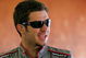 LOUDON, NH - JUNE 27:  Martin Truex Jr., driver of the #1 TomTom Chevrolet,waits in the garage prior to practice for the NASCAR Sprint Cup Series LENOX Industrial Tools 301 at New Hampshire Motor Speedway on June 27, 2009 in Loudon, New Hampshire.  (Photo by Jerry Markland/Getty Images for NASCAR)