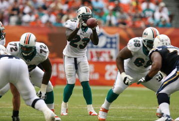 MIAMI - OCTOBER 05:  Running back Ronnie Brown #23 of the Miami Dolphins takes a direct snap while taking on the San Diego Chargers at Dolphin Stadium on October 5, 2008 in Miami, Florida. The Dolphins defeated the Chargers 17-10.  (Photo by Doug Benc/Getty Images)