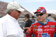 BROOKLYN, MI - JUNE 14:(L-R) Team Owner Rick Hendrick speaks with Mark Martin, driver of the #5 CARQUEST/Kellogg's Chevrolet, during the NASCAR Sprint Cup Series LifeLock 400 at Michigan International Speedway on June 14, 2009 in Brooklyn, Michigan.  (Photo by Ezra Shaw/Getty Images)