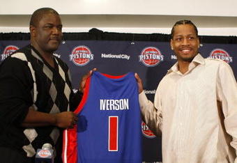 AUBURN HILLS, MI - NOVEMBER 04:  Allen Iverson #1 of the Detroit Pistons is introduced at press conference by President of Basketball Operations Joe Dumars after being traded from the Denver Nuggets on November 4, 2008 at the Palace of Auburn Hills in Auburn Hills, Michigan. NOTE TO USER: User expressly acknowledges and agrees that, by downloading and or using this photograph, User is consenting to the terms and conditions of the Getty Images License Agreement.  (Photo by Gregory Shamus/Getty Images)