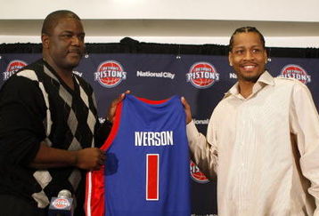 AUBURN HILLS, MI - NOVEMBER 04:  Allen Iverson #1 of the Detroit Pistons is introduced at press conference by President of Basketball Operations Joe Dumars after being traded from the Denver Nuggets on November 4, 2008 at the Palace of Auburn Hills in Auburn Hills, Michigan. NOTE TO USER: User expressly acknowledges and agrees that, by downloading and or using this photograph, User is consenting to the terms and conditions of the Getty Images License Agreement.  (Photo by Gregory Shamus/Getty Images)