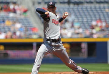 ATLANTA - APRIL 12: Pitcher Scott Olsen #19 of the Washington Nationals starts against the Atlanta Braves April 12, 2009 at Turner Field in Atlanta, Georgia.  (Photo by Al Messerschmidt/Getty Images) 