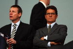LONDON, ENGLAND - APRIL 15:  England Manager Fabio Capello (R) and England coach Stuart Pearce  look on prior to the UEFA Champions League Quarter Final Second Leg match between Arsenal and Villarreal at the Emirates Stadium on April 15, 2009 in London, England.  (Photo by Hamish Blair/Getty Images)