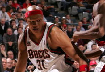 MILWAUKEE - MARCH 07: Charlie Villanueva #31 of the Milwaukee Bucks moves against James Jones #33 of the Portland Trail Blazers on March 7, 2008 at the Bradley Center in Milwaukee, Wisconsin. The Trail Blazers defeated the Bucks 103-101. NOTE TO USER: User expressly acknowledges and agreees that, by downloading and/or using this Photograph, User is consenting to the terms and conditions of the Getty Images License Agreement. (Photo by Jonathan Daniel/Getty Images)