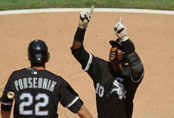 CHICAGO - JUNE 28: Alexei Ramirez #10 of the Chicago White Sox points to the sky after hitting a two-run home run and driving in teammate Scott Podsednik #22 in the 3rd inning against the Chicago Cubs on June 28, 2009 at U.S. Cellular Field in Chicago, Illinois. The White Sox defeated the Cubs 6-0. (Photo by Jonathan Daniel/Getty Images)