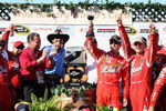SONOMA, CA - JUNE 21: Kasey Kahne, driver of the #9 Budweiser Dodge, celebrates in victory lane with his team and owner Richard Petty after winning the NASCAR Sprint Cup Series Toyota/Save Mart 350 at the Infineon Raceway on June 21, 2009 in Sonoma, California.  (Photo by Christian Petersen/Getty Images for NASCAR)