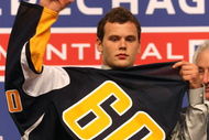 MONTREAL, QC - JUNE 26:  Zack Kassian puts on his new Buffalo Sabres sweater after he was selected #13 overall by the Sabres during the first round of the 2009 NHL Entry Draft at the Bell Centre on June 26, 2009 in Montreal, Quebec, Canada.  (Photo by Bruce Bennett/Getty Images)