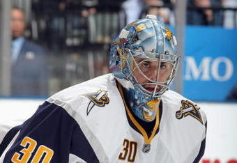 TORONTO - APRIL 8:  Goalie Ryan Miller #30 of the Buffalo Sabres guards the net against the Toronto Maple Leafs during their NHL game at the Air Canada Centre on April 8, 2009 in Toronto, Ontario. (Photo by: Dave Sandford/Getty Images)
