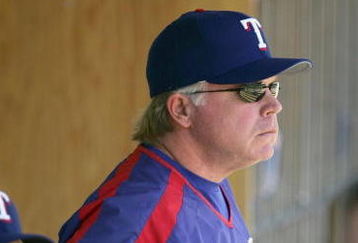 CHICAGO - JUNE 04: Manager Buck Showalter #11 of the Texas Rangers watches as his team gets a win over the Chicago White Sox on June 4, 2006 at U.S. Cellular Field in Chicago, Illinois. The Rangers defeated the White Sox 10-2. (Photo by Jonathan Daniel/Getty Images) 