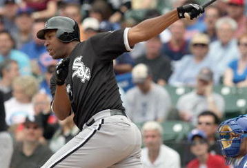 CHICAGO - JUNE 17: Jermaine Dye #23 of the Chicago White Sox makes a hit against the Chicago Cubs on June 17, 2009 at Wrigley Field in Chicago, Illinois. (Photo by Jonathan Daniel/Getty Images)
