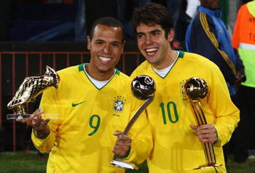 JOHANNESBURG, SOUTH AFRICA - JUNE 28:  Luis Fabiano (L) of Brazil poses with the adidas Silver Ball awarded to the second most outstanding player of the tournament and the adidas Golden Shoe awarded for the tournaments top scorer, as team mate Kaka poses with the adidas Golden Ball awarded to the most outstanding player of the tournament at the end of the FIFA Confederations Cup Final between USA and Brazil at the Ellis Park Stadium on June 28, 2009 in Johannesburg, South Africa.  (Photo by Alex Livesey/Getty Images)