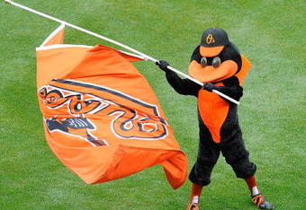 BALTIMORE - APRIL 06:  The Orioles Mascot carries a flag before the game between the Baltimore Orioles and the New York Yankees during opening day on April 6, 2009 at Camden Yards in Baltimore, Maryland.  (Photo by Greg Fiume/Getty Images)