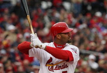 ST. LOUIS - APRIL 06:  :  :  Albert Pujols #5 of the St. Louis Cardinals takes a swing against the Pittsburgh Pirates during Opening Day on April 6, 2009  at Busch Stadium in St. Louis, Missouri. The Pittsburgh Pirates defeated the St. Louis Cardinals 6-4.  (Photo by Elsa/Getty Images)