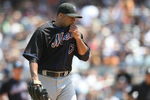 NEW YORK - JUNE 14: Johan Santana #57 of the New York Mets wipes sweat from his face against the New York Yankees on June 14, 2009 at Yankee Stadium in the Bronx borough of New York City.  (Photo by Nick Laham/Getty Images)