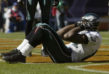 CHICAGO - OCTOBER 3:  Wide receiver Terrell Owens #81 of the Philadelphia Eagles celebrates in the endzone during the game against the Chicago Bears on October 3, 2004 at Soldier Field in Chicago, Illinois. The Philadelphia Eagles defeated the Chicago Bears 19-9. (Photo by Elsa/Getty Images)