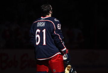 COLUMBUS, OHIO - APRIL 23:  Rick Nash #61 of the Columbus Blue Jackets stands during the playing of the national anthem prior to playing against the Detroit Red Wings during Game Four of the Western Conference Quarterfinals of the 2009 Stanley Cup Playoffs on April 23, 2009 at the Nationwide Arena in Columbus, Ohio. The Red Wings defeated the Blue Jackets 6-5 on a late goal by Johan Franzen to eliminate the Blue Jackets 4 games to 0. (Photo by Claus Andersen/Getty Images