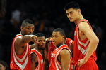 LOS ANGELES, CA - MAY 06:  (L-R) Ron Artest #96, Aaron Brooks #0, Kyle Lowry #7 and Yao Ming #11 of the Houston Rockets huddle against the Los Angeles Lakers in Game Two of the Western Conference Semifinals during the 2009 NBA Playoffs at Staples Center on May 6, 2009 in Los Angeles, California. NOTE TO USER: User expressly acknowledges and agrees that, by downloading and or using this photograph, User is consenting to the terms and conditions of the Getty Images License Agreement.  (Photo by Harry How/Getty Images)