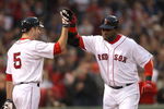 BOSTON - JUNE 11:  David Ortiz #34 of the Boston Red Sox hits a home run and celebrates with teammate Rocco Baldelli against the New York Yankees at Fenway Park on June 11, 2009 in Boston, Massachusetts.  (Photo by Jim Rogash/Getty Images)