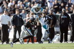 OAKLAND - NOVEMBER 9:  Steve Smith #89 of the Carolina Panthers collides with Nnamdi Asomugha #21of the Oakland Raiders at the Oakland-Alameda County Coliseum on November 9, 2008 in Oakland, California. (Photo by: Jed Jacobsohn/Getty Images)