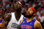BOSTON - MAY 28:  Rasheed Wallace #36 and Richard Hamilton #32 of the Detroit Pistons box out against Kevin Garnett #5 of the Boston Celtics during Game Five of the Eastern Conference finals during the 2008 NBA Playoffs at TD Banknorth Garden on May 28, 2008 in Boston, Massachusetts. NOTE TO USER: User expressly acknowledges and agrees that, by downloading and/or using this photograph, user is consenting to the terms and conditions of the Getty Images License Agreement.  (Photo by Jim Rogash/Getty Images)