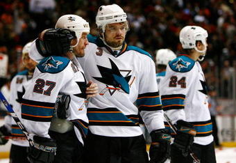 ANAHEIM, CA - APRIL 27:  Jeremy Roenick #27 and Douglas Murray #3 of the San Jose Sharks console each other after being eliminated from the playoffs by the Anaheim Ducks during Game Six of the Western Conference Quarterfinal Round of the 2009 Stanley Cup Playoffs at the Honda Center on April 27, 2009 in Anaheim, California.  (Photo by Jeff Gross/Getty Images)
