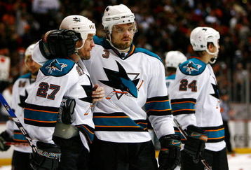 ANAHEIM, CA - APRIL 27:  Jeremy Roenick #27 and Douglas Murray #3 of the San Jose Sharks console each other after being eliminated from the playoffs by the Anaheim Ducks during Game Six of the Western Conference Quarterfinal Round of the 2009 Stanley Cup Playoffs at the Honda Center on April 27, 2009 in Anaheim, California.  (Photo by Jeff Gross/Getty Images)